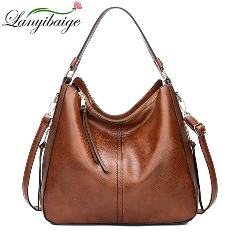 brown designer shoulder bag.